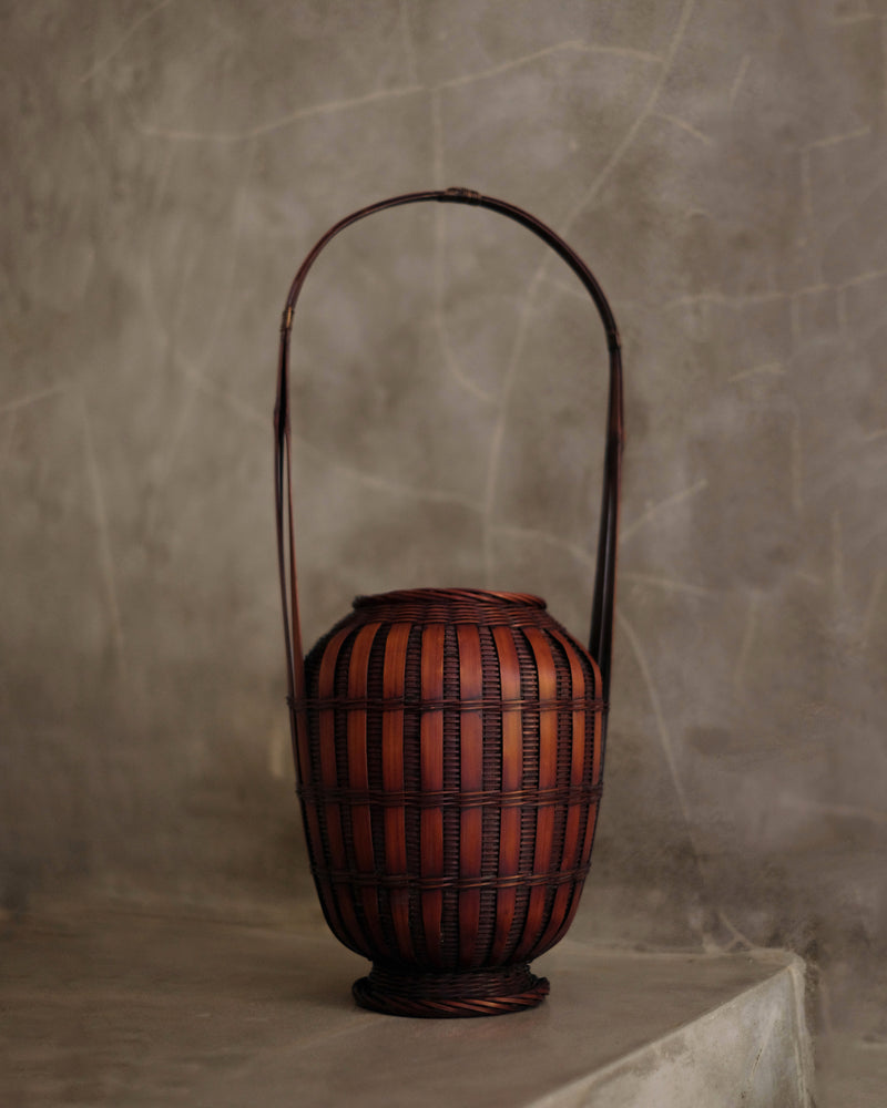 Japanese bamboo ikebana basket with tall handle, full view