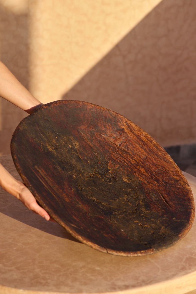Moroccan walnut couscous bowl — top view showing wear and repair.