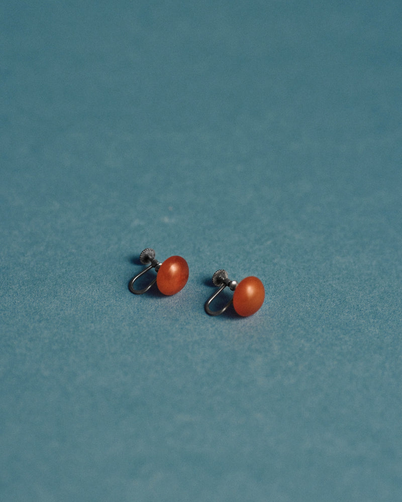 Amber and sterling silver earrings (925), c.1930s — pair, studio view.