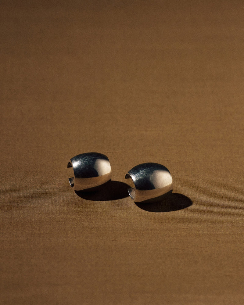 French Art Deco wide hoop earrings in sterling silver (925) — pair, studio view.