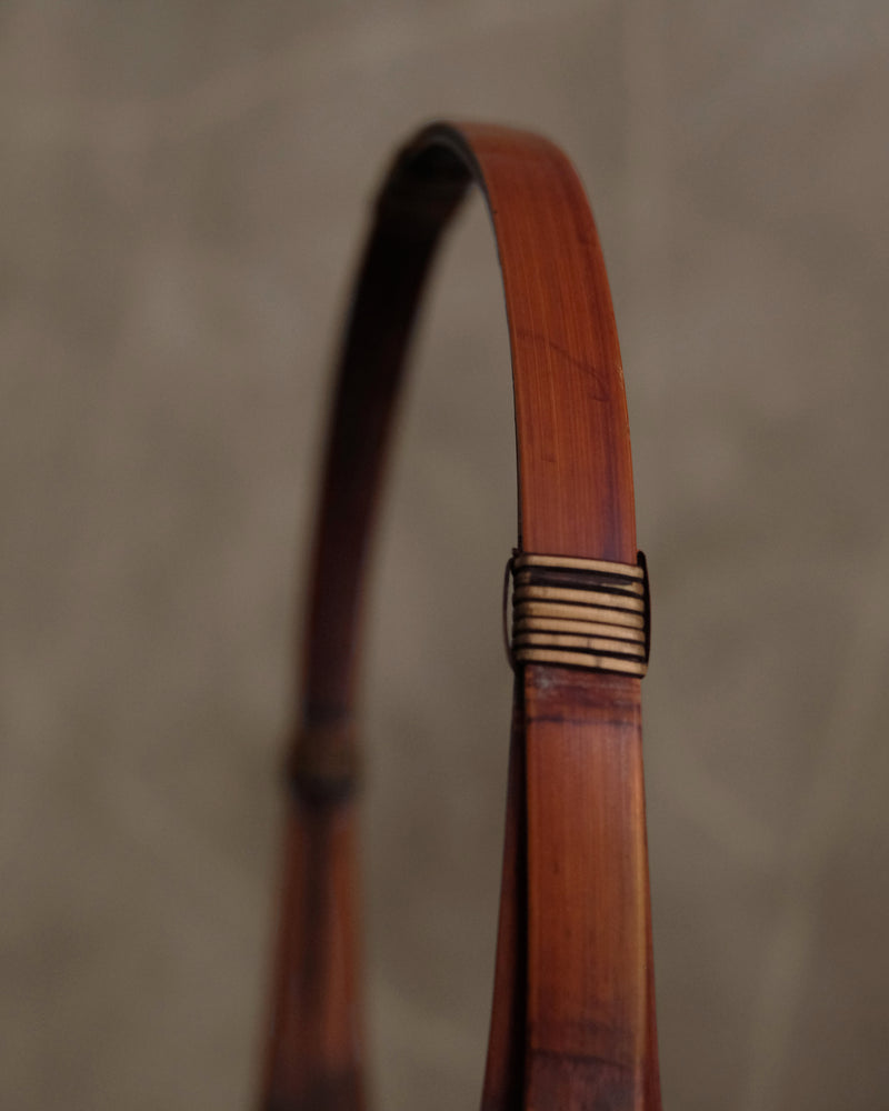 Detail of arched handle on Japanese bamboo ikebana basket