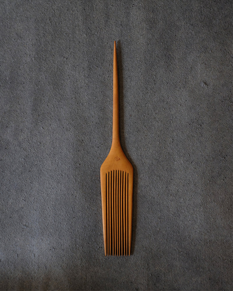 Long-handled Japanese maple wood comb with fine teeth