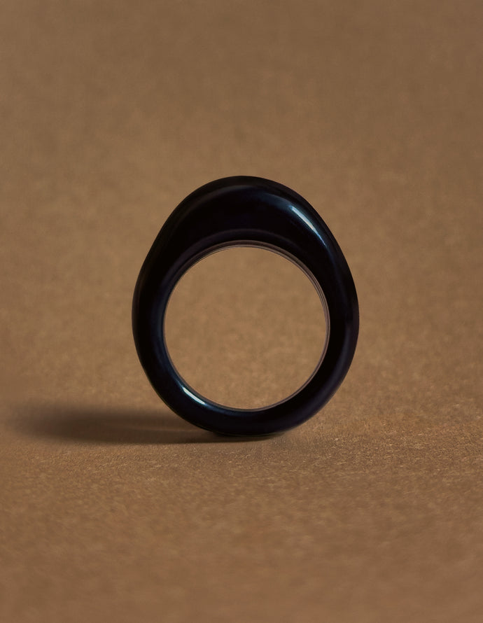 Black onyx ring, late 20th century — domed polished band