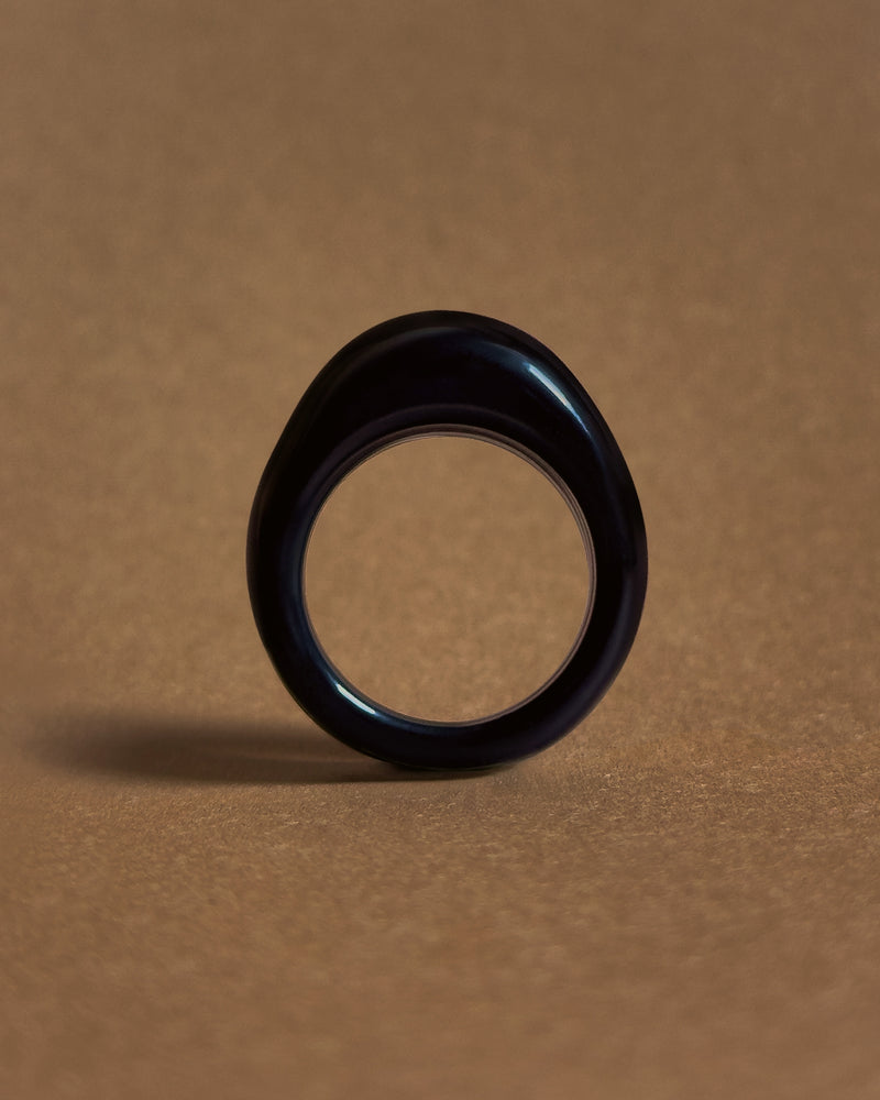 Black onyx ring, late 20th century — domed polished band