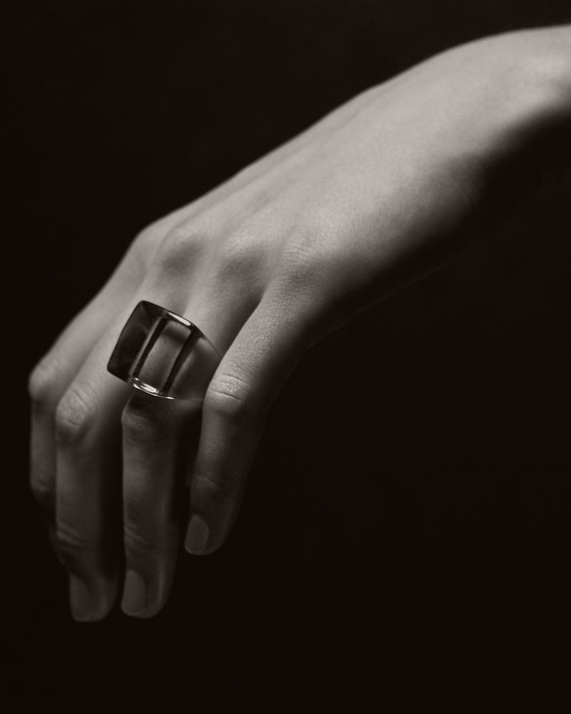 Amber resin ring — worn on hand, Ourika Valley, Morocco.