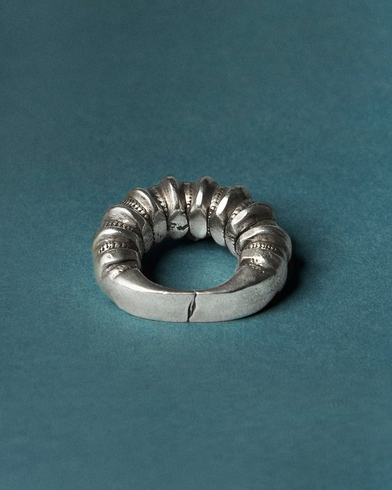 Berber (Amazigh) silver ring — detail view of markings and surface.