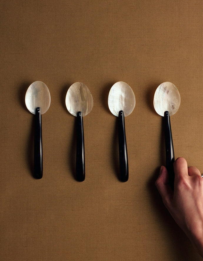Italian mother of pearl and Bakelite spoons, 1930s–40s — set of four.