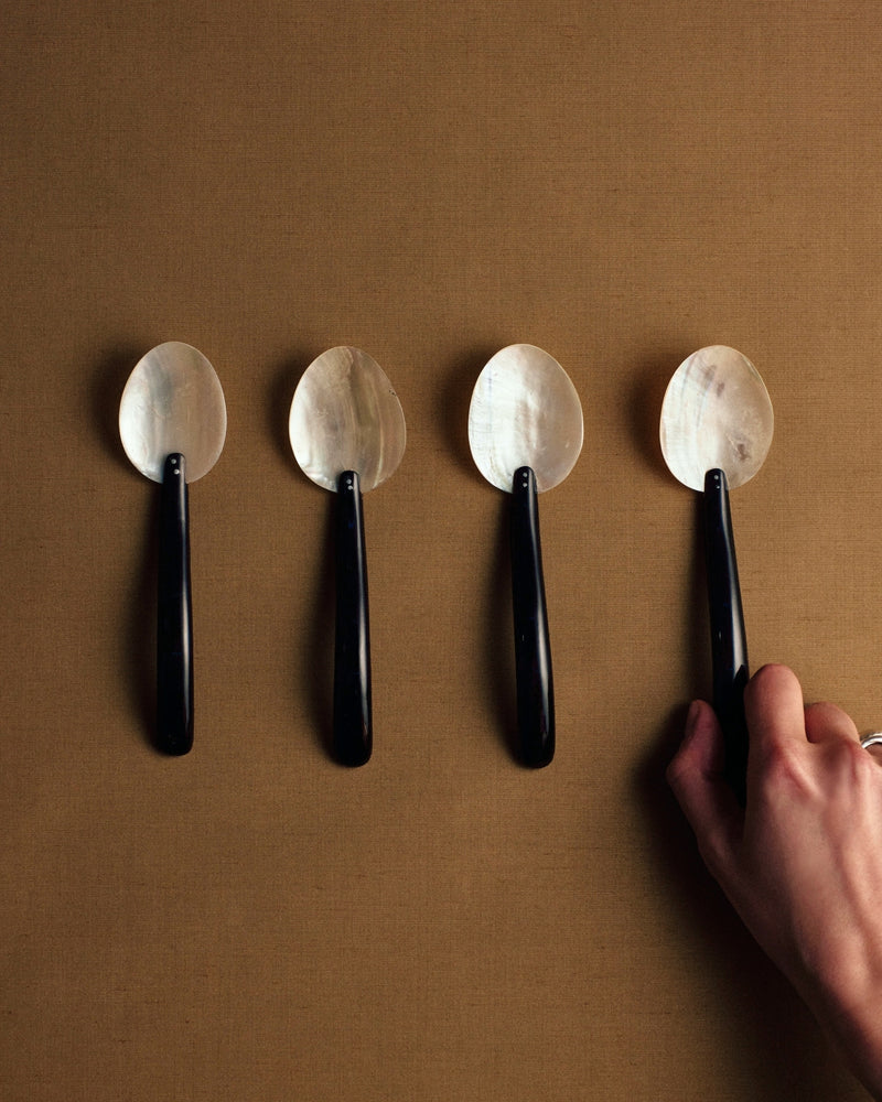 Italian mother of pearl and Bakelite spoons, 1930s–40s — set of four.