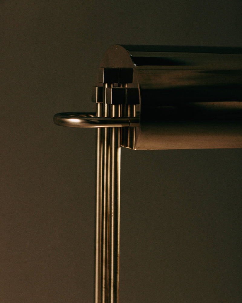 Marcel Breuer table lamp, Paris 1925 — angled view of head and supports.